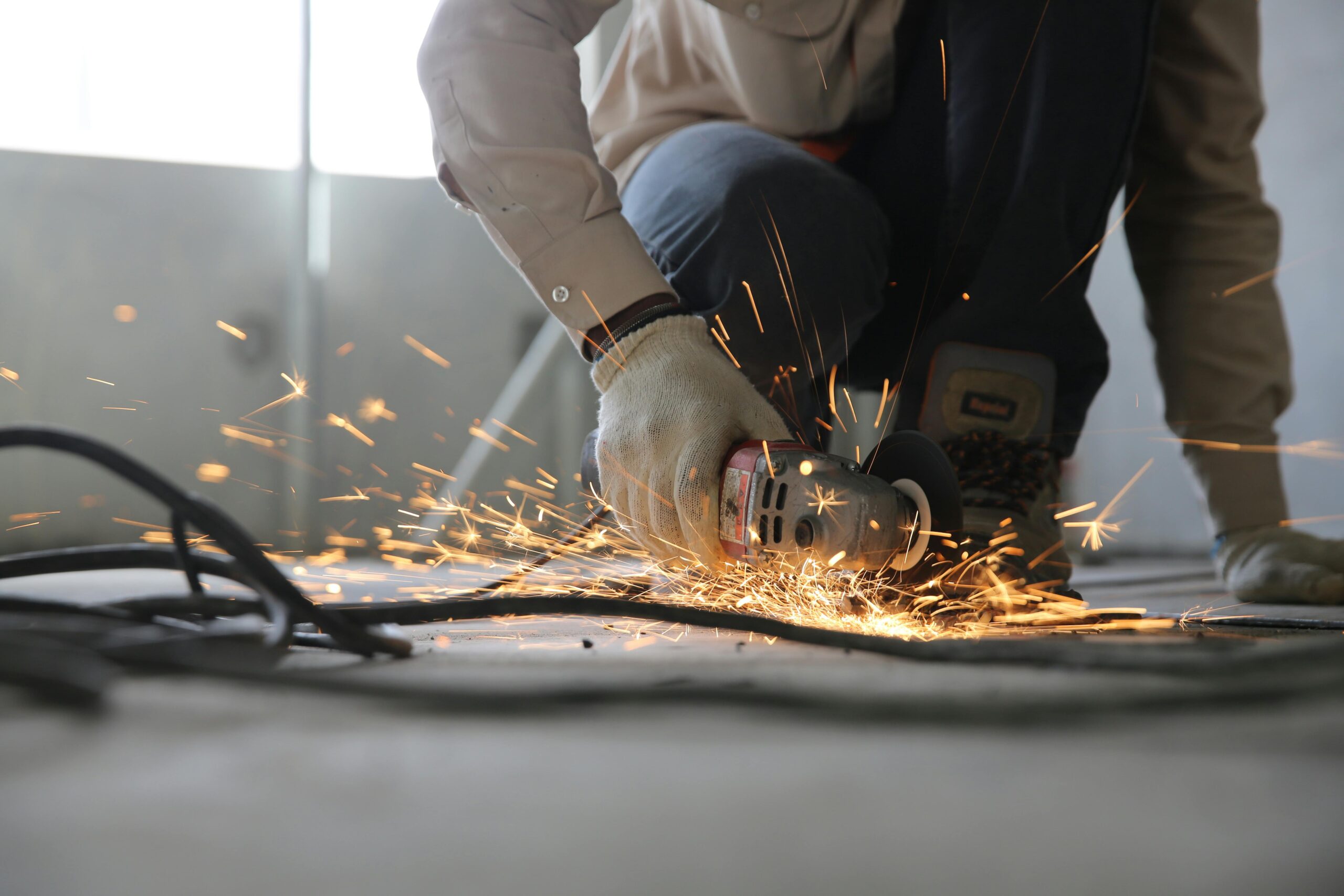 man using a grinder